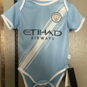 Manchester City babykläder 2025 hemma krypoverall för baby